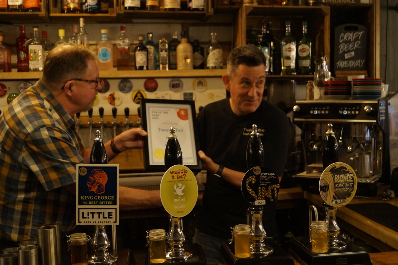 North Derbyshire Area Organiser Peter Boitoult presents TwentyTen owner Rob Short with North Derbyshire Pub of the Year award