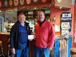 Receiving donation from Tim Webster