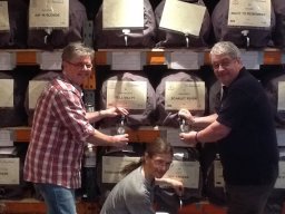 Gary Sleigh, Alan Haselden and Kevin Johnson assist with dispensing beer on Friday afternoon.