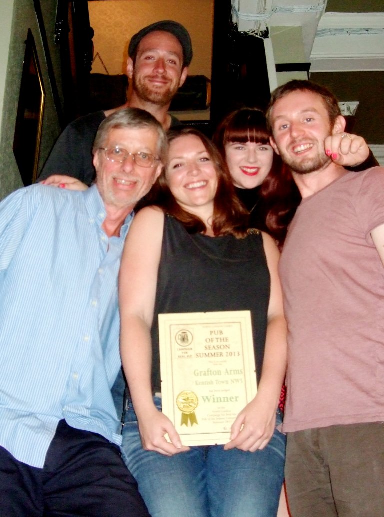 Picture shows Branch Chairman John Cryne (left) with the pub's management team - Joel, Susie, Aidan and Bel. 