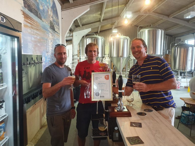 Falmouth Beer Festival Presentation to the Nico and Ben at the Black Flag Brewery. Bronze Award for Champion Golden ale of Cornwall 2018 for Chameleon 