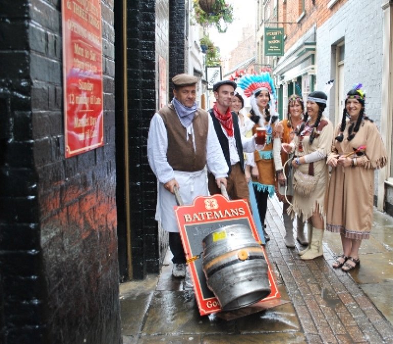 Indian Queen Ale arrives at Bostonâ€™s Indian Queen and Three Kings â€“ delivered by Victorian drayman for the day Paul Withrington, Indian Queen Pocahontas, Beth Warsop, and her squaws, Glyn Ruskin, Paula Naylor and Lucy Taylor