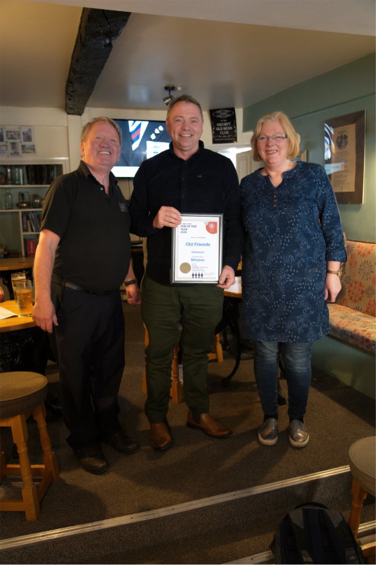 Graham and Andrea Wilson of The Old Friends in Ulverston receiving their certificate for Branch Pub of the Year 2020 from Branch Chairman Dave Stubbins