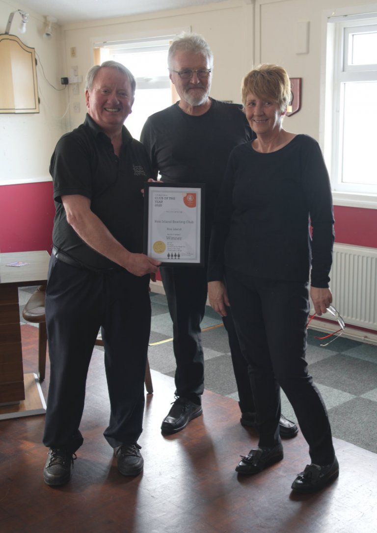 Paul and Lorraine Bibby of the Roe Island Boat Club receiving their certificate for Branch Club of the Year 2020 from Dave Stubbins, Branch Chairman
