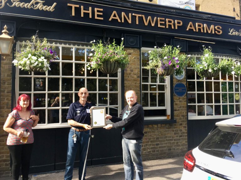 Peter Passam receives the Award from Colin Coyne (right)