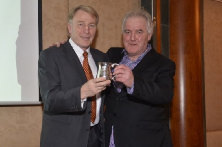 Derek Prentice (left) receives the Award as Brewer of the Year from Tim Hampson, Chairman British Guild of Beer Writers