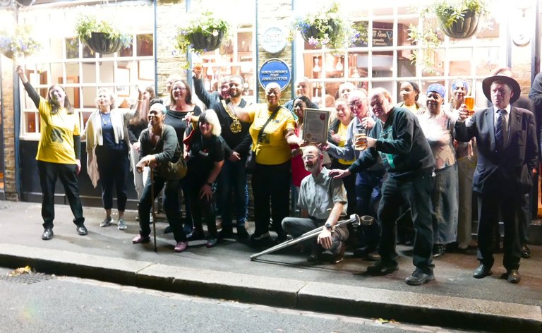 Locals and guests toast the Hero of Heroes London Lockdown Award.