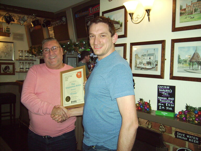 Presentation of POTY 2021 award to Kevin by Dave