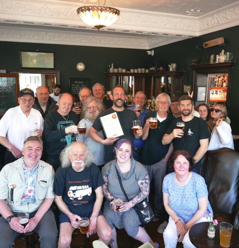 CAMRA members from across the country celebrate the Carlton's winning 2022 West London Pub of the Year. 