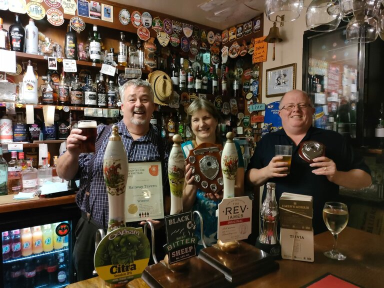 Keith & Dawn Jacklin Licensees of the Railway Tavern receiving their awards from Chairman of Louth & District CAMRA Jerry Gale 20/5/2022