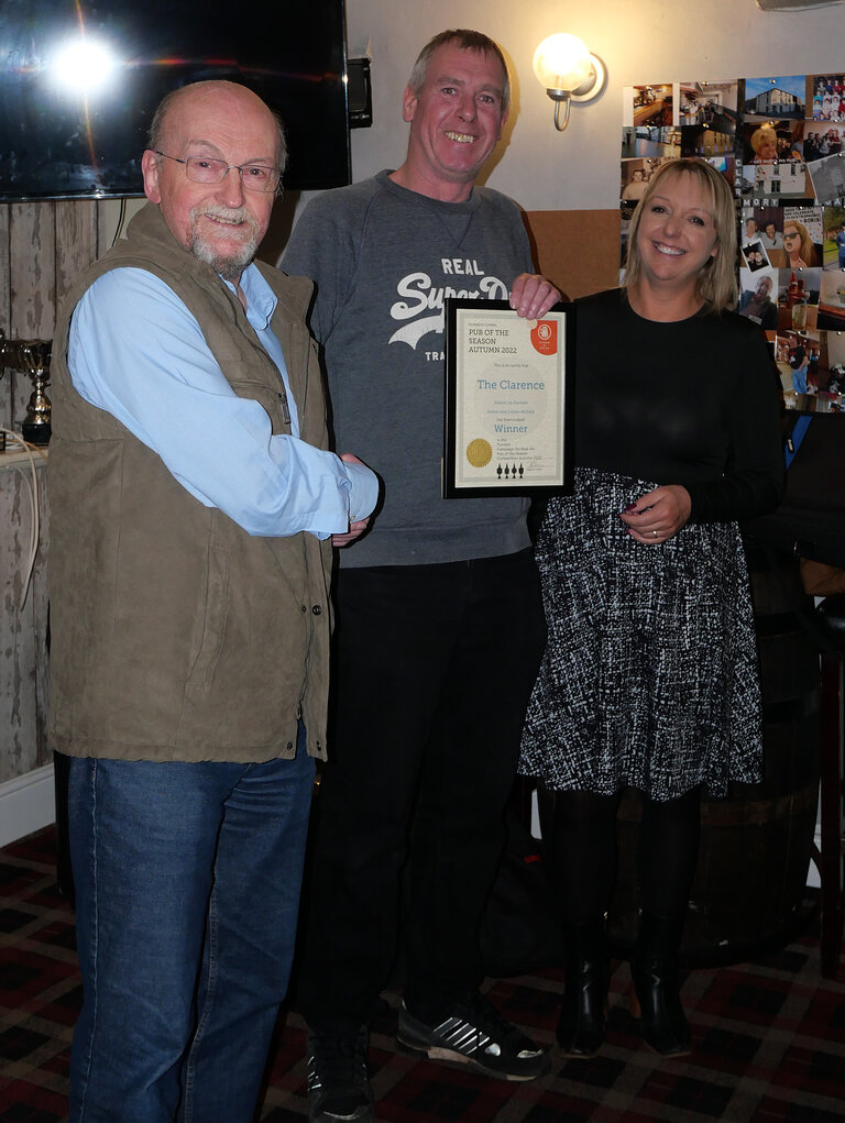 Kieran and Louise McDaid of The Clarence, Dalton-in-Furness receiving the Branch Pub of the Season Award for Autumn 2022 from Furness Branch Chair Jack Summers-Glass 