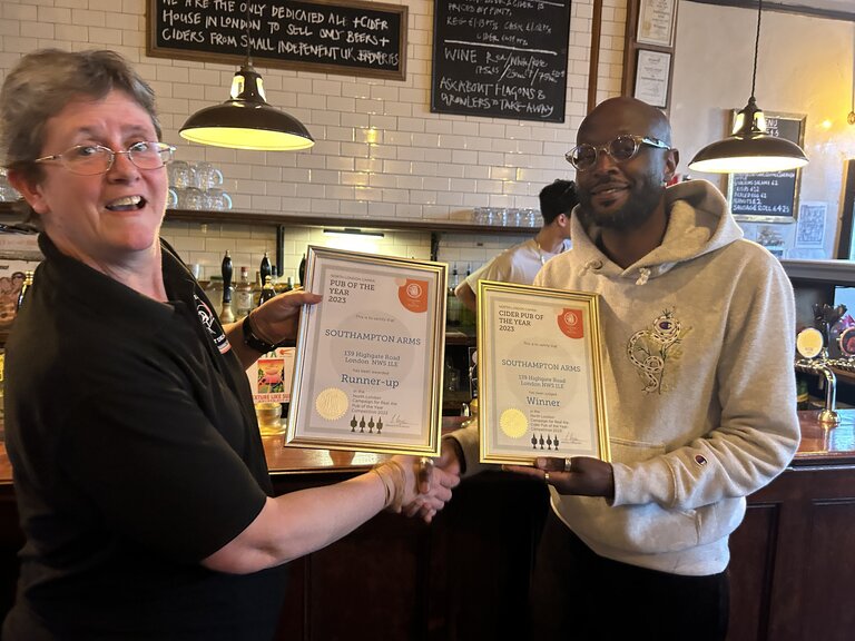 Jessica Marsh Branch Cider Representative presents the 2023 Cider Pub of the Year Award and, for good measure, the Runner-Up Award in the 2023 Overall Pub of the Year Contest.