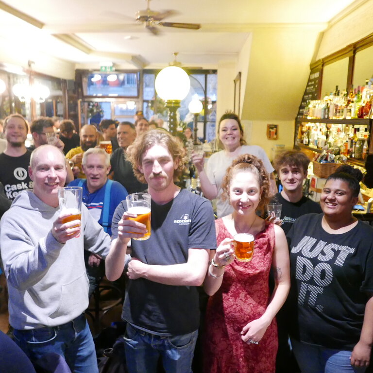 This picture features founder Andy Moffat (in grey shirt on the left), next to him is Dom Barton from Redemption and next to him is Tash from Mother Kelly's/Queen's Head, the evening's hosts. The bar staff to the right of the pic feature as does our own Dave Marsh!