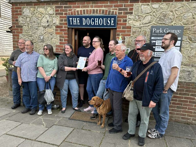 Presenting a certificate for winning Branch Pub of the Year 2024.