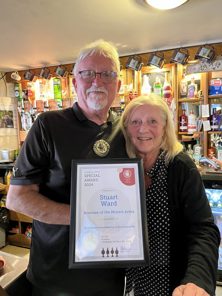 Stuart Ward with the Furness CAMRA award for his continued contribution to the community.