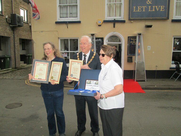 Andrea Briers, Mayor, Rozi Woods