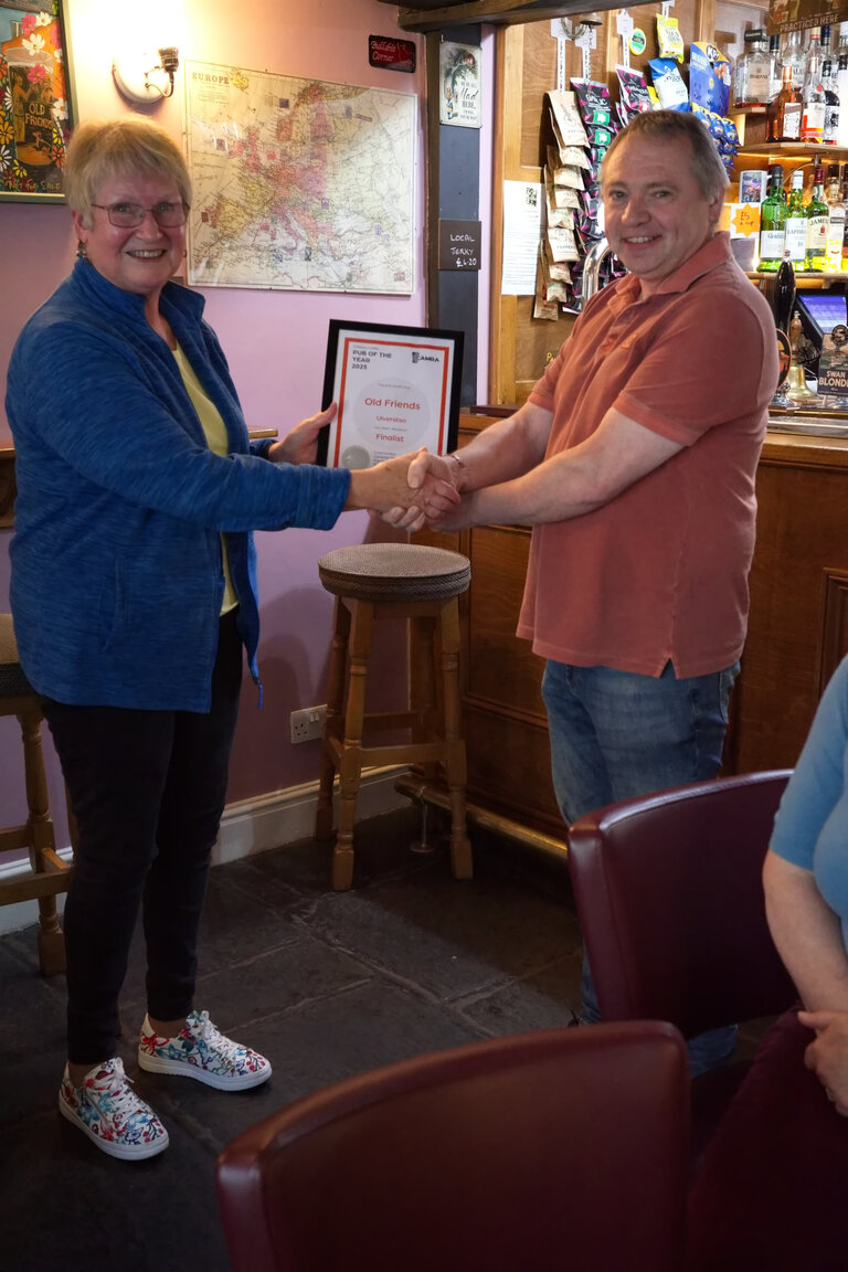 Jan Ridal presents the Certificate for Runner Up in Furness CAMRA Pub of the Year Award for 2025 to Graham at The Old Friends in Ulverston. Graham is also the Brewer and there is another post on this page for his North West Regional CboB award.