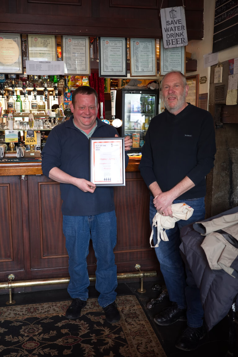 Scott Varty receiving the Certificate for Furness CAMRA Pub of the Year (Finalist) from Alan Clark. Not the first time that the Manor Arms in Broughton has received a Certificate - I think Scott uses them as wallpaper there are so many of them!