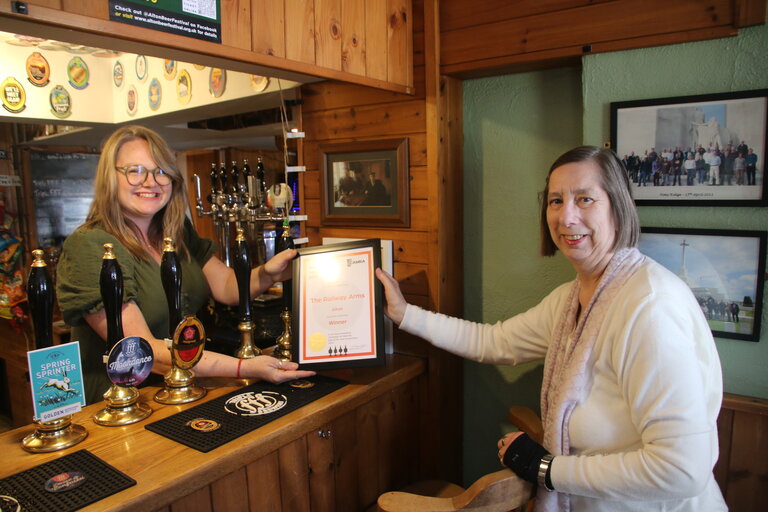  On 26 April Shirley Hawley, Chair of the branch was very pleased to present Chloe Watson, landlady of the Railway Arms near Alton Station with the branch award for Pub of the Year 2025.