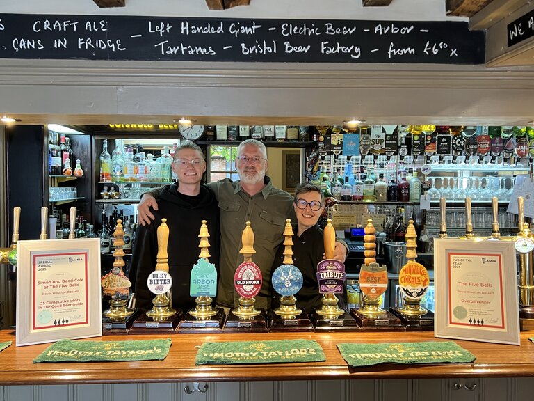 Bar at the Five Bells with their two certificates.