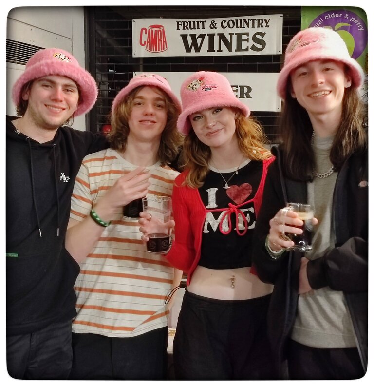 Young friends enjoying beers at Oldham Beer & Cider Festival April 2023.