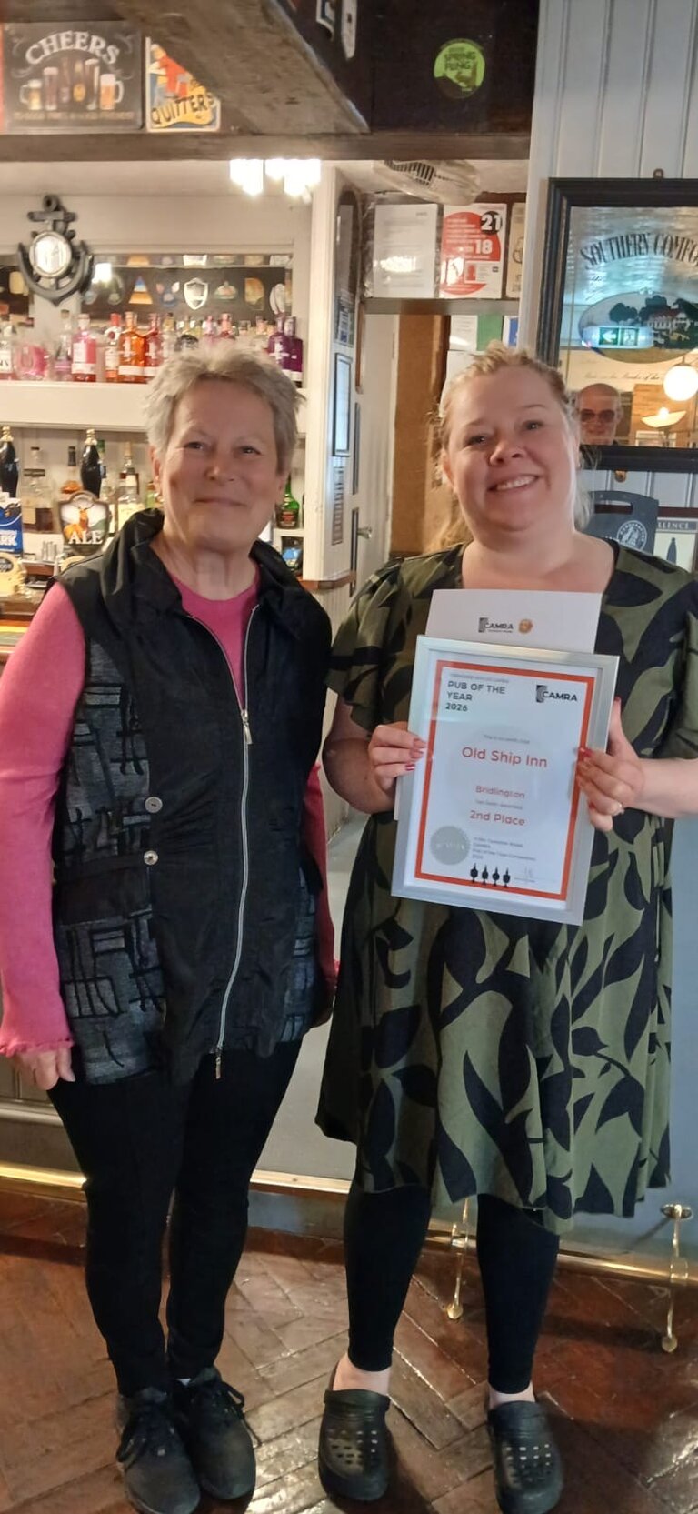 Chair Jonquil Beynon presenting Lena from The OId Ship Inn with their Pub of the Year Runner-Up certificate. Chair Jonquil Beynon presenting Lena from The OId Ship Inn with their Pub of the Year Runner-Up certificate.