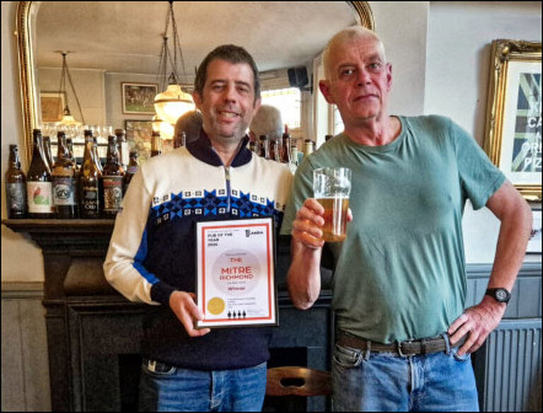 Chris French of the Mitre, Richmond, was presented with the Pub of the Year award by Bob Gordon Branch Chairman during a Pizza Night Branch social.