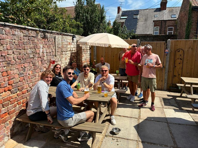 Drinkers enjoy the sunshine in the Three B's Micropub beer garden, July 2026. Drinkers enjoy the sunshine in the Three B's Micropub beer garden, July 2026.