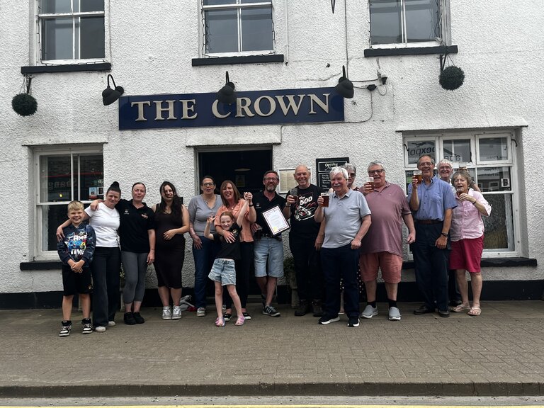 Staff and Fenland CAMRA outside the Crown